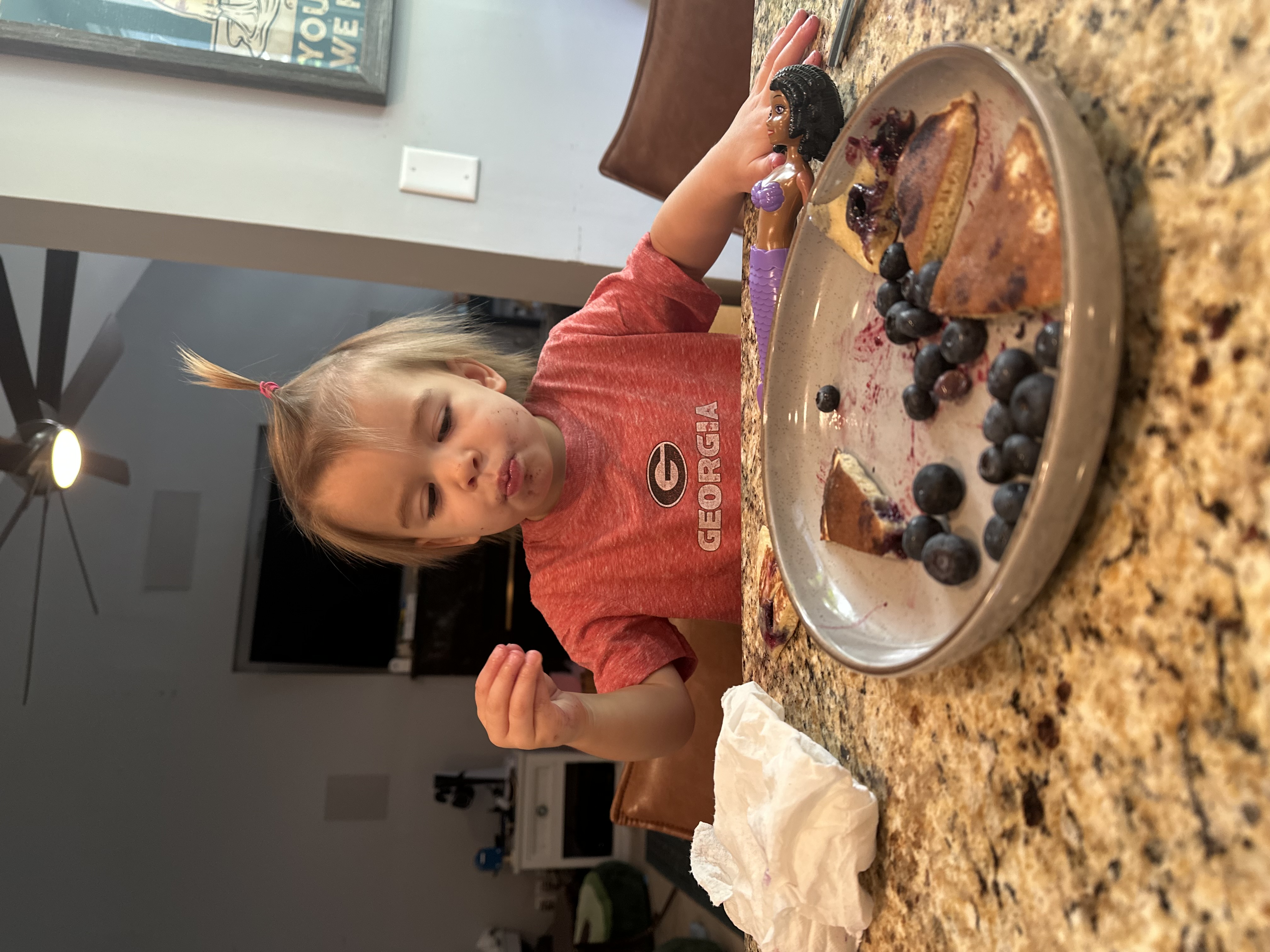 Camilla eating homemade pancakes