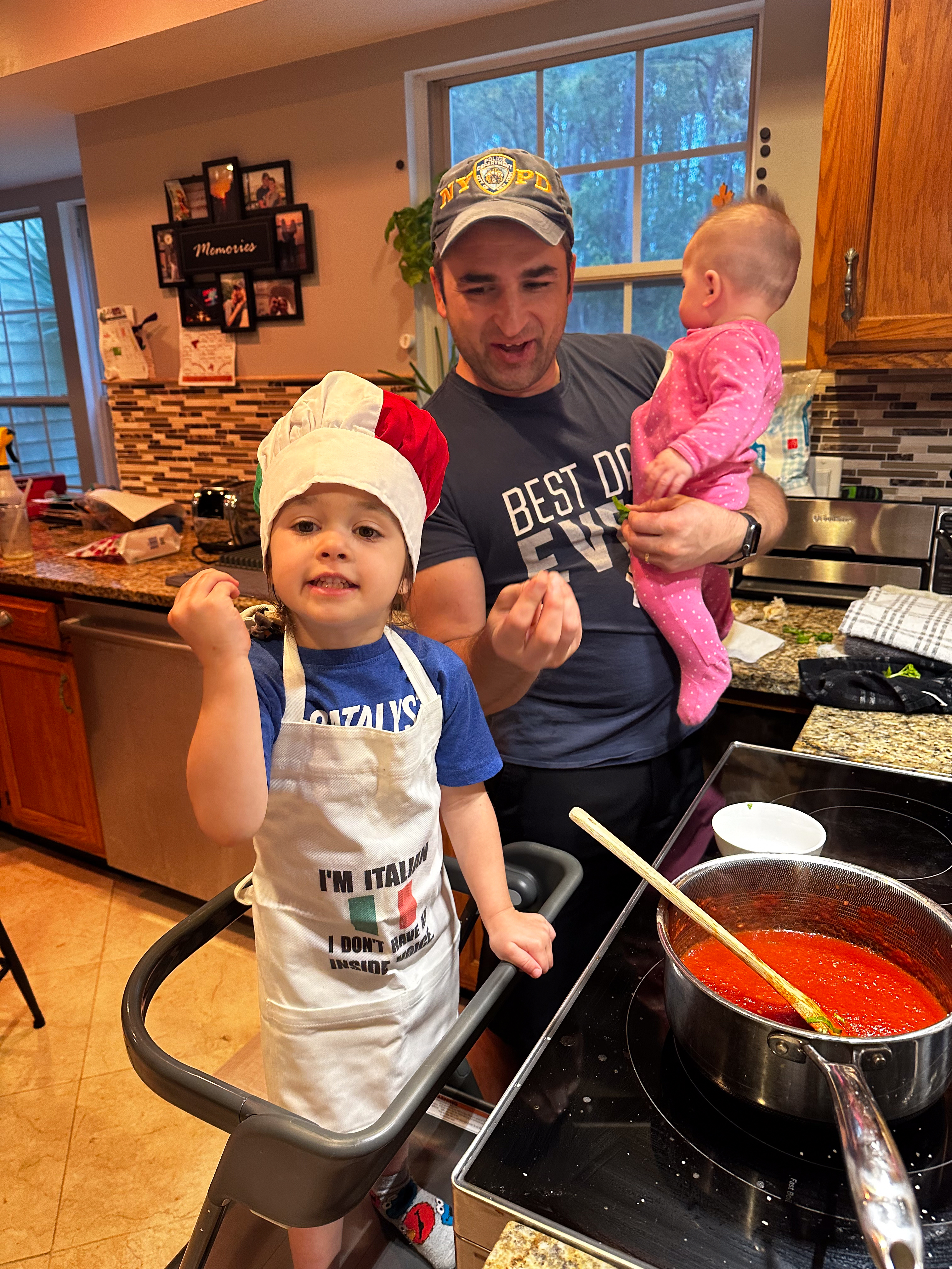 Maurizio cooking with his girls